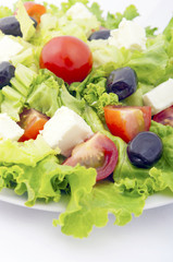 fresh salad with tomato and lettuce