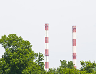 Fototapeta na wymiar Factory chimneys pollution air