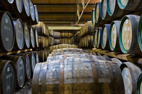 Whisky Barrels In A Distillery