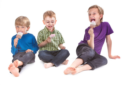 Three Kids Eating Ice Lolly