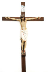 Crucified Jesus Christ on wooden cross, isolated
