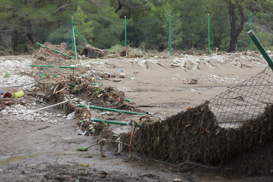 Destroyed Chainlink Fence after Flood Disaster