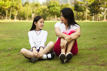 asian mother and daughter having a conversation