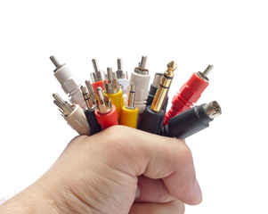 Audio and video plugs in hand