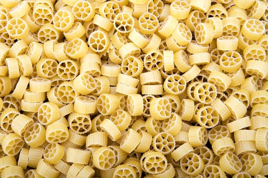 Raw Wagon Wheel Pasta Noodles Closeup Macro