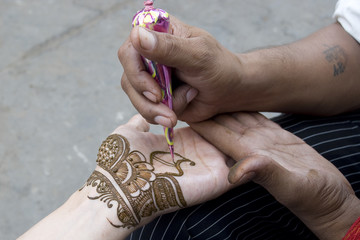 fresh henna application on palm, Jaipur,India