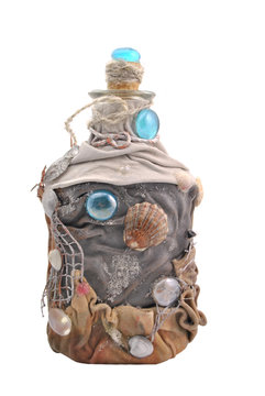 handmade bottle decorated using different techniques of decoupag