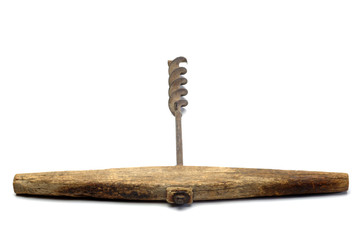 Vintage wooden hand drill isolated on white background