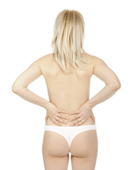 Fototapeta premium Woman massaging pain back isolated over a white background.