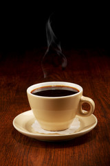 Coffee cup on wooden table
