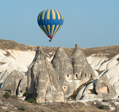 Balloon Over Rock Cave Houses, Cappadocia