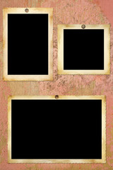 Vintage blank picture frames on old paper texture