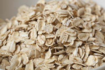 Dry oatmeal in a bowl