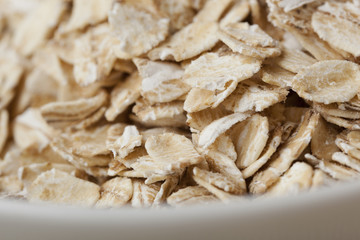 Dry oatmeal in a bowl