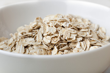 Dry oatmeal in a bowl