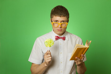 Young man bookworm reading
