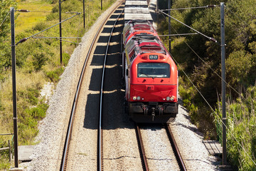 Cargo Train passing with some  freight wagons, in Portugal