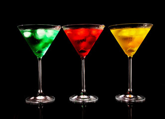 Martini drinks on black background