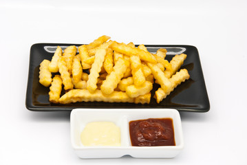 French fries in black plate