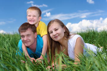 Fototapeta premium family with son on the meadow
