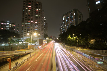 Fototapeta na wymiar Modern Urban City with Freeway Traffic at Night, hong kong