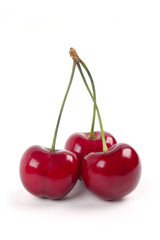 Red cherries isolated on a white background