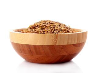 Uncoocked barley in plate isolated on white