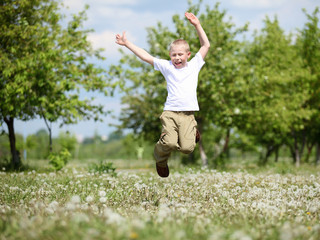 little boy playing in the park