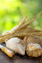 Portuguese bread and  spikes of wheat.