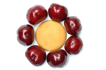 Cookies with cherries around forming flower head