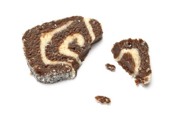 Coco roll slice with crumbs overhead view