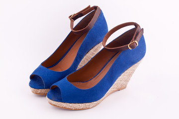 a pair of blue platform shoes