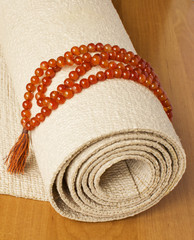 Yoga mat and rosaries