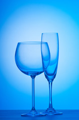 Wine glasses against gradient background