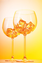Glasses of water against gradient background