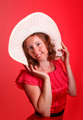 Lady in red with summer hat