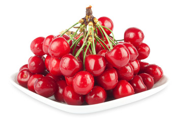 Fresh ripe cherries on a white background isolated