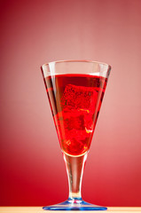 Colourful cocktail in glasses with ice