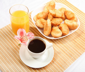 Breakfast coffee and croissants