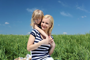 mother with her daughter outdoors