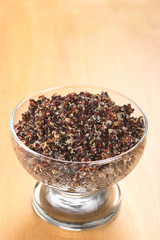 Cooked red quinoa in glass bowl