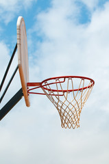 Basket hoop over sky