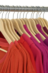 A line fashion red clothing hanging on hangers