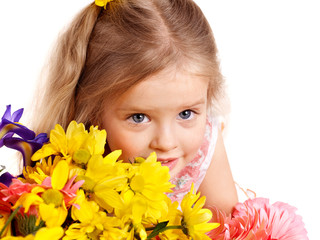 Happy child holding flowers.