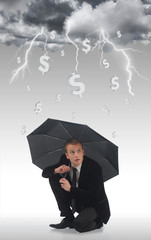 Young business man holding an umbrella