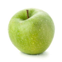 A ripe green apple with water drops