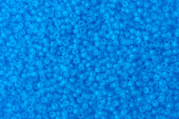 polished blue glass beads background