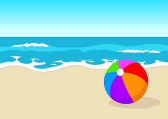Colourful ball at the beach