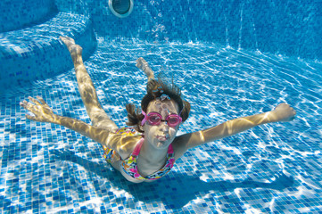 Underwater kid in swimming pool