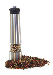 pepper mill and several pepper grains isolated in white